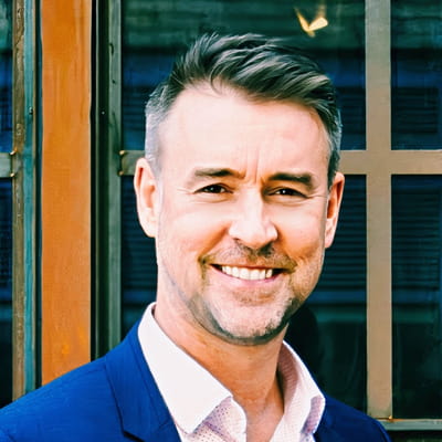 Headshot of Ian Wilding smiling