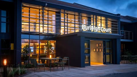 Burleigh Court lit up at dusk