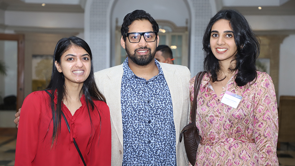 Three alumni at an event in New Delhi in 2022