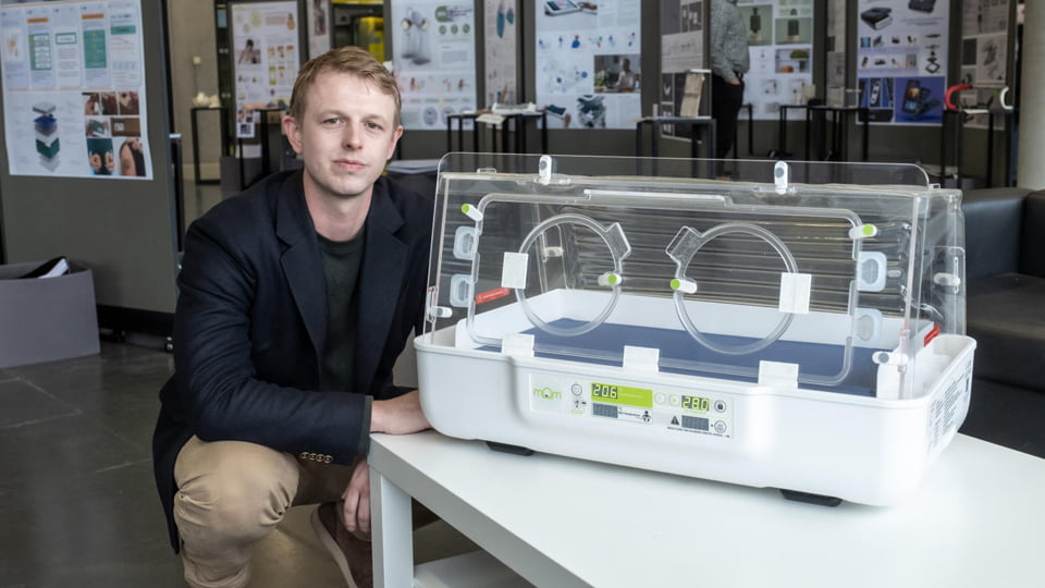 James Roberts MBE with the mOm incubator at the Loughborough Design Degree Show