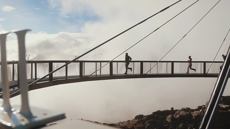 People on a large bridge running