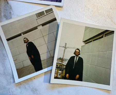 Two polaroid style images of Simon in a graduation gown