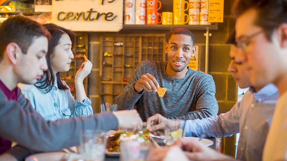 a group of students in a cafe