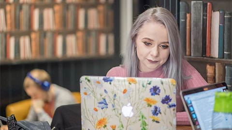 Student studying in the Loughborough University Students' Union