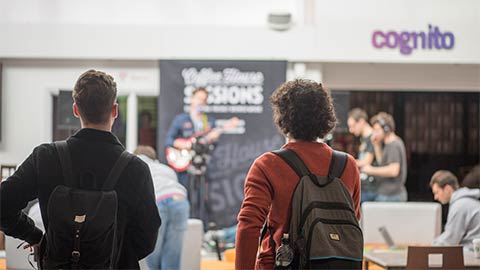 Students walking through Loughborough University Students' Union