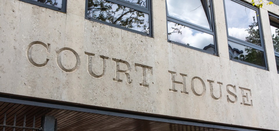 the front of a court house in the UK