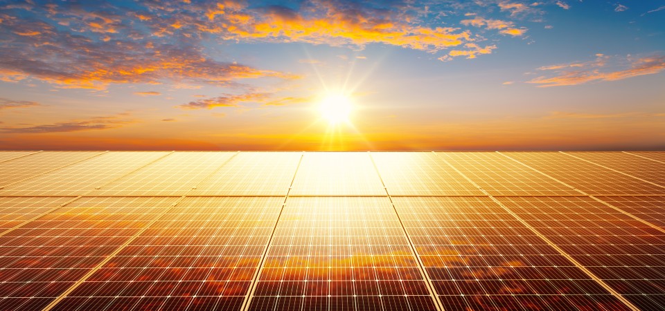 The sun reflecting off solar panels