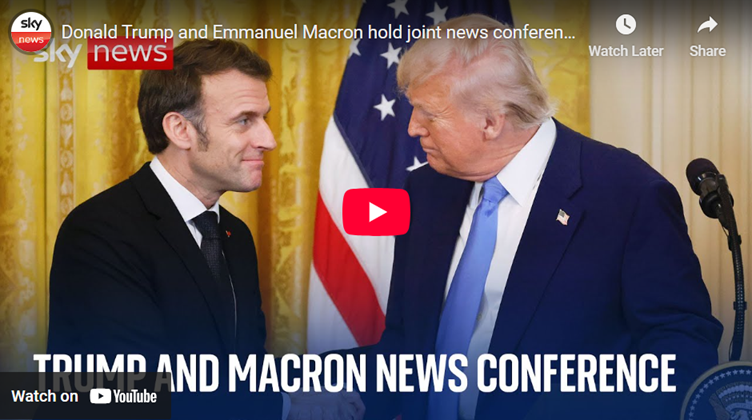 Macron shakes Trump's hand