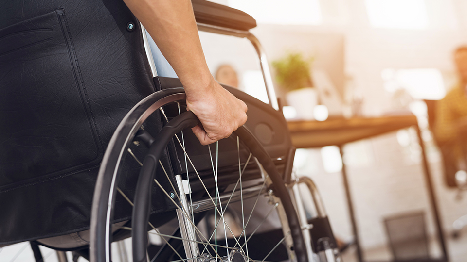close up of person using a wheelchair