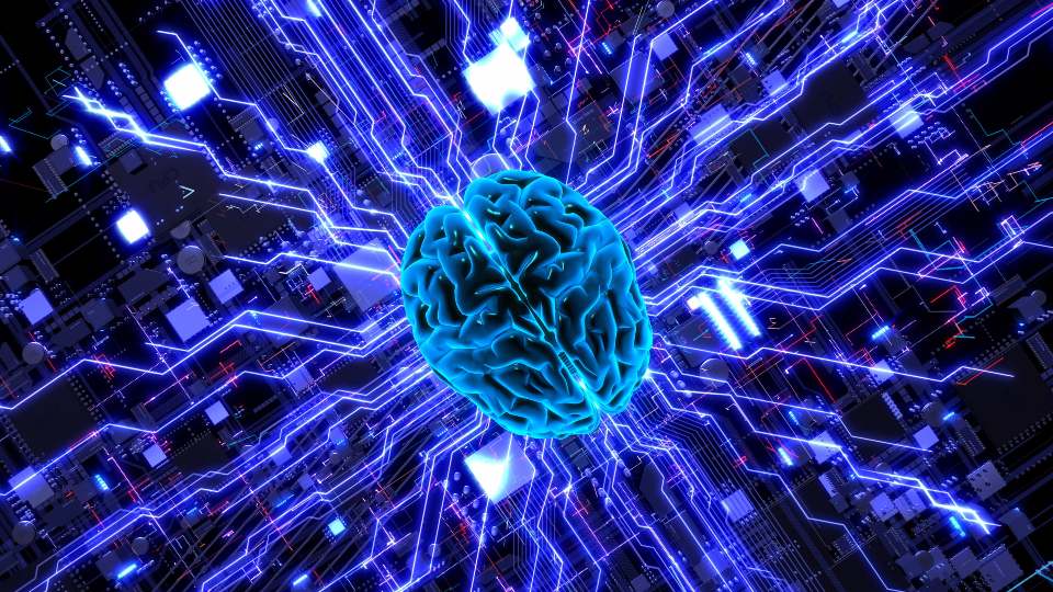 A glowing blue brain at the centre of a digital circuit board, with electric connections radiating outward to represent artificial intelligence and data processing.