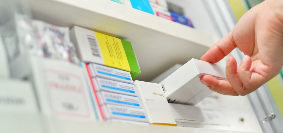 Boxes of antibiotics on a shelf