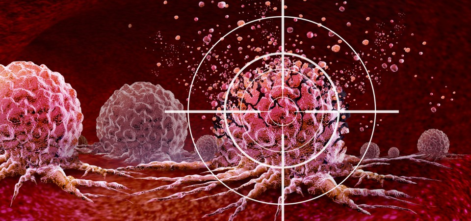 A cancer cell being targeted with crosshairs