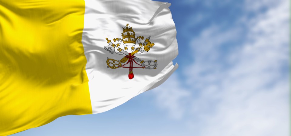 The flag of Vatican City - the home of the Pope