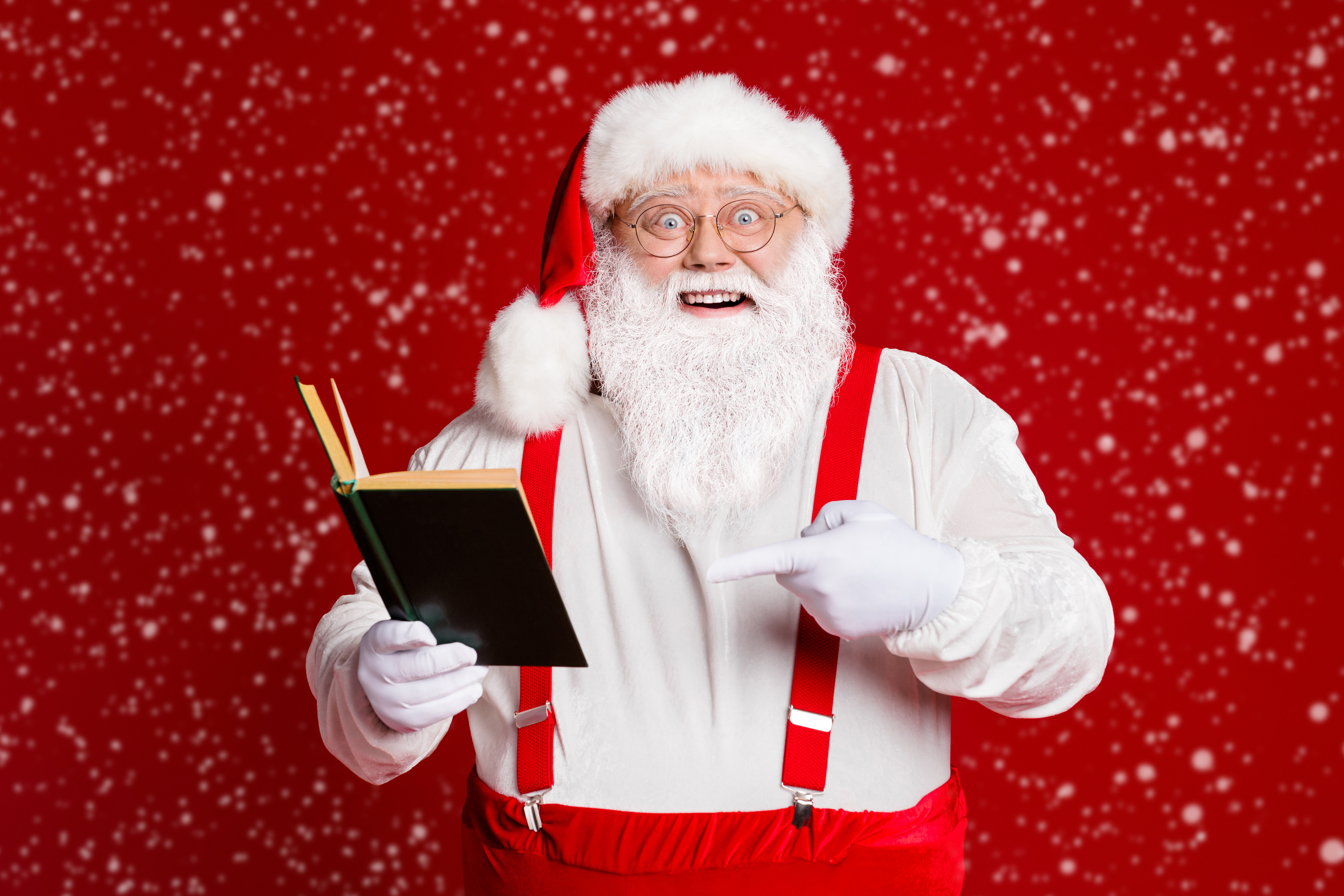 Santa reads his joke book