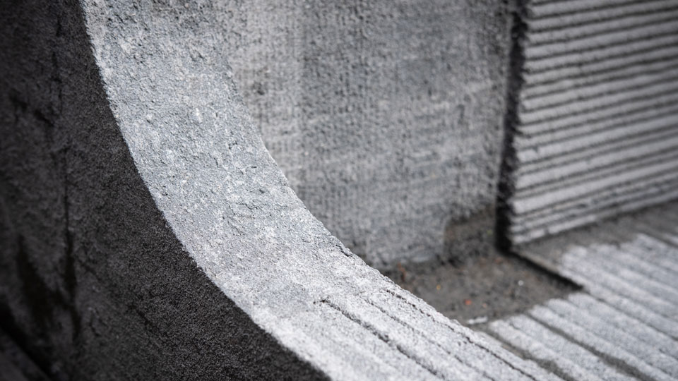 Close-up photograph of a section of printed concrete - showing its complex curves and angles