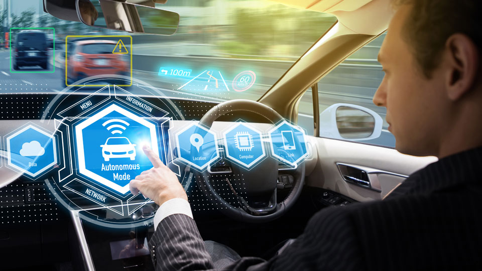 Interior of an autonomous car (showing sensor instrumentation) with a view through the windscreen