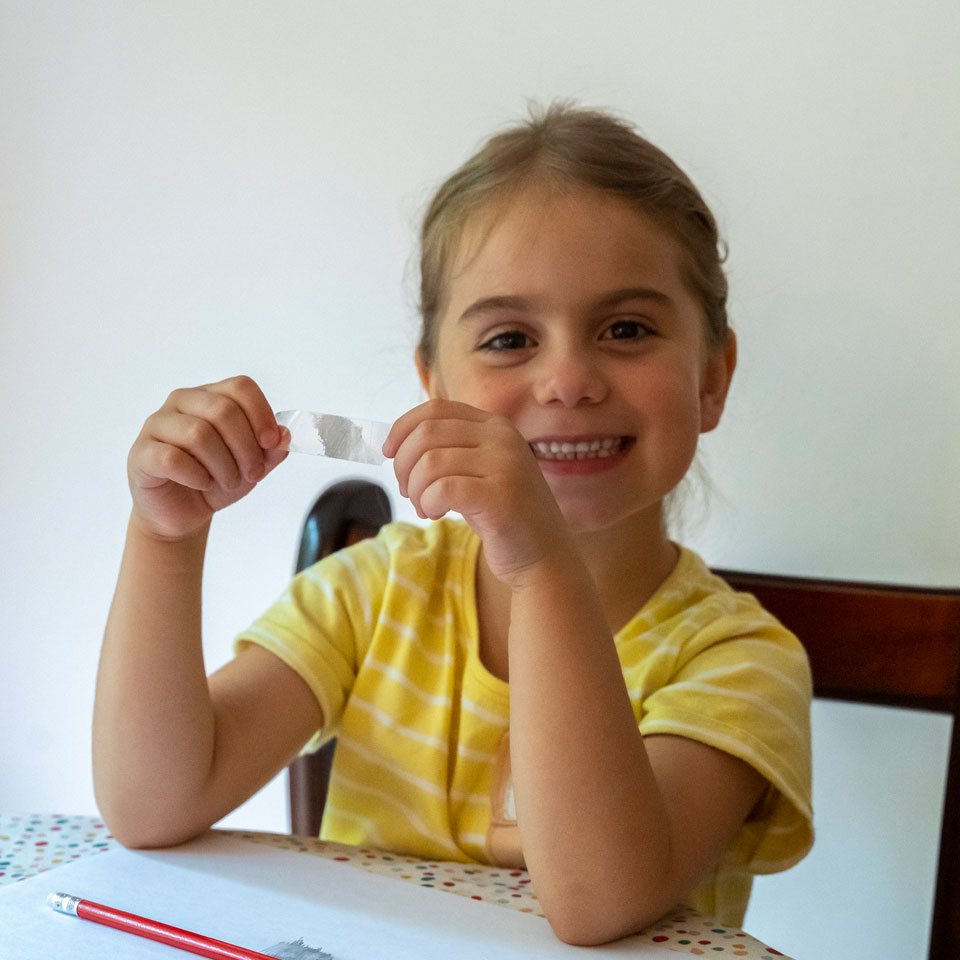 Child creating their own graphene flakes