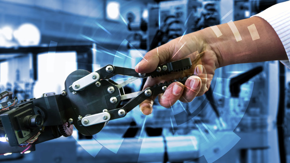 A human and robotic handshake