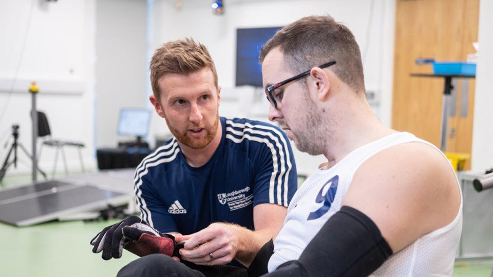 Dr Barry Mason working with a parathlete at PHC