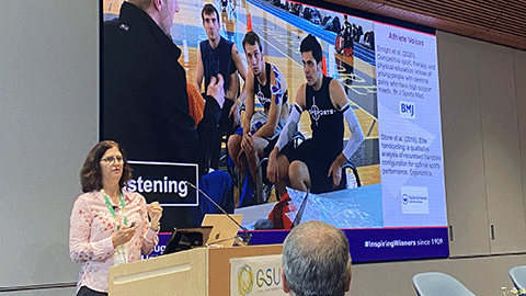 Professor Vicky Goosey-Tolfrey delivering a presentation at GSUN summit.