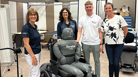 3 female and 1 male researcher in Human Engineering Research Laboratory at Pittsburgh University