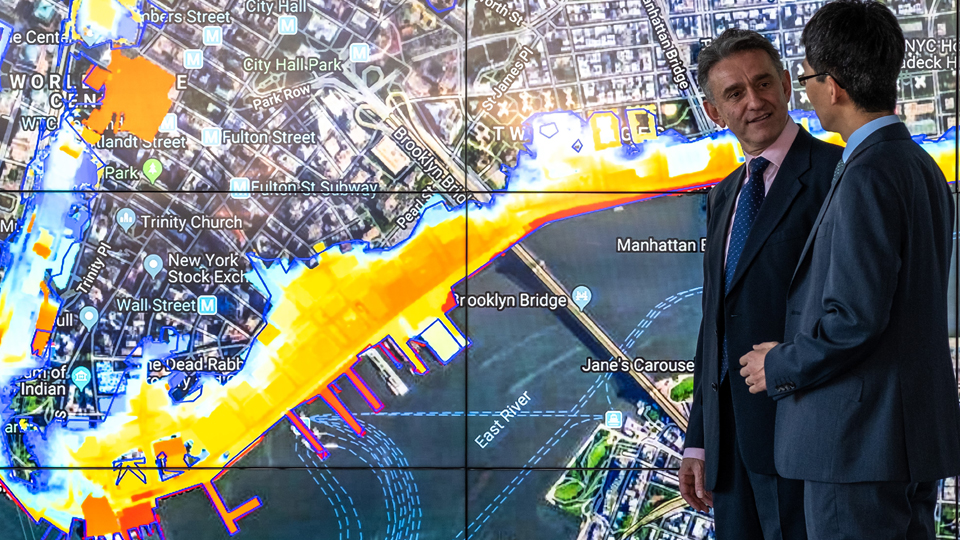 Researchers reviewing FloodMap Live data