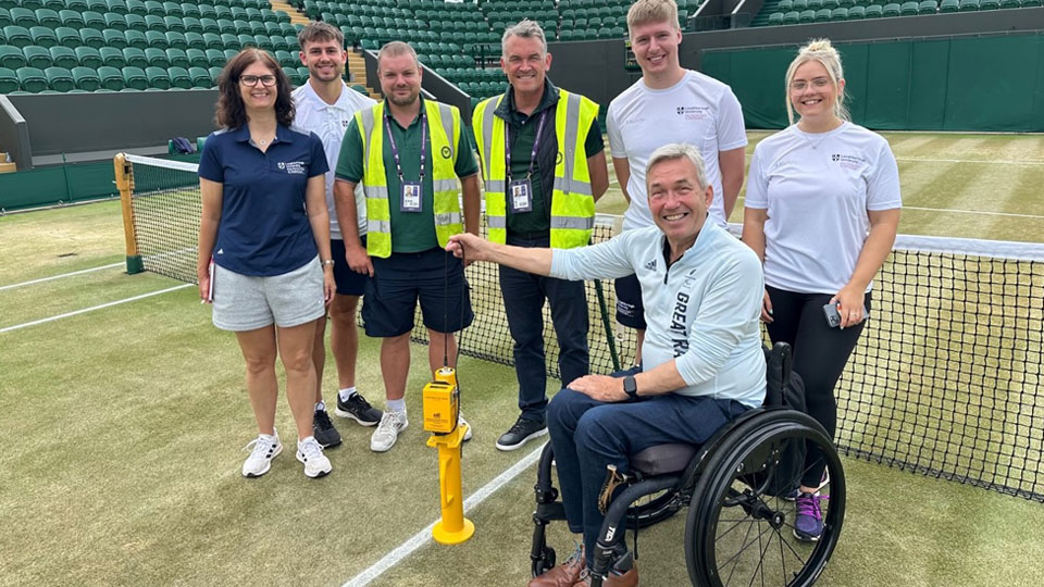 L-R: Prof Vicky Tolfrey (Loughborough University), Owen Tolfrey (Loughborough University), Will Brierley and Neil Stuley (AELTC Ground staff), Thomas Rietveld (Loughborough University), Ellie-May Storr (Loughborough University) and front Nick Webborn (Chair of BPA, Visiting Clinical Professor, Loughborough University)