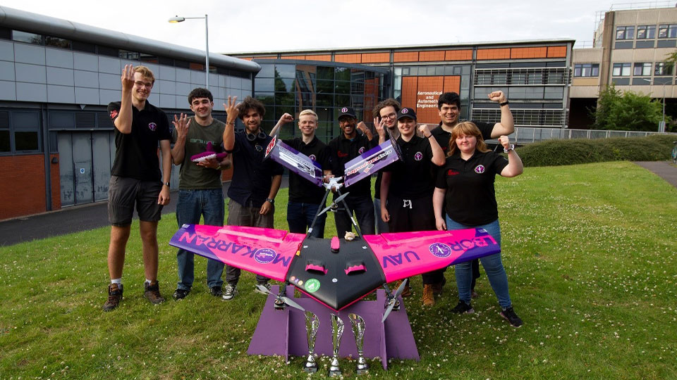 Lboro UAV team with their aeroplane