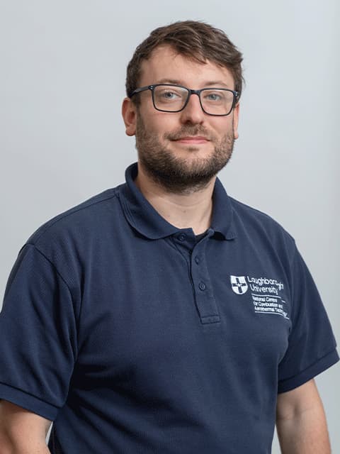 Headshot of Max in a lboro branded polo shirt