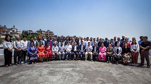 a group of people posing for a photo