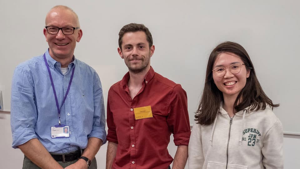 Jack Green with an academic member of staff and a fellow student.