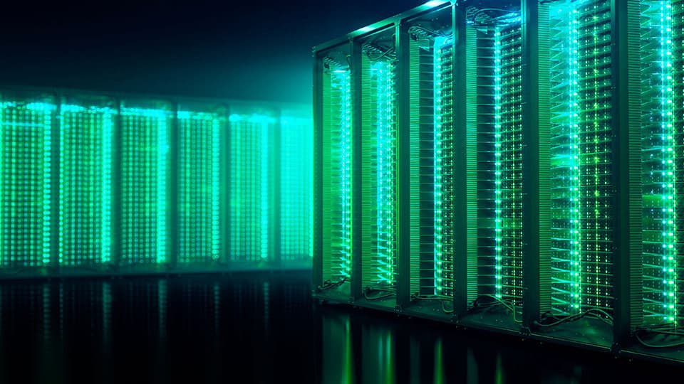 A data centre illuminated with green light