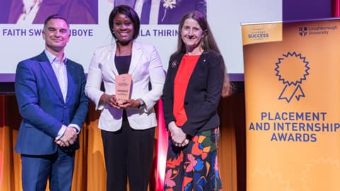 Faith Swiss-Ajiboye receives the Overall Postgraduate Internship Award from Professor Sam Grogan and Professor Rachel Thomson.
