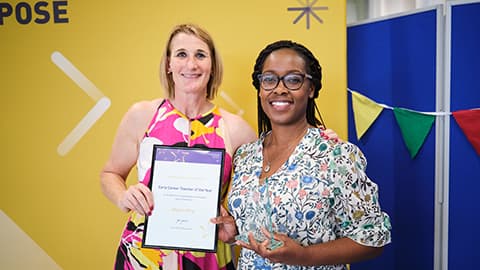 Allyson King receiving an award from the Dean.
