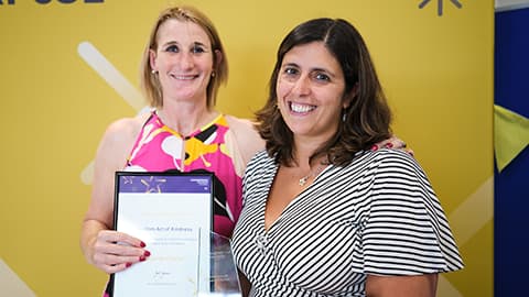 Eduarda Castro receiving an award from the Dean.