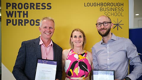 Tom Jackson and Ian Hodgkinson receiving an award from the Dean.