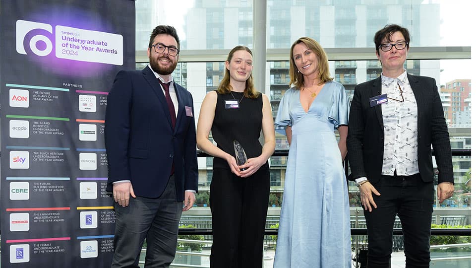 Tilly Sawyer on stage with her award alongside three other people at the targetjobs Undergraduate of the Year Awards.
