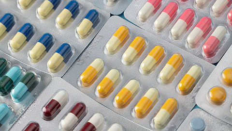 A range of pills in packaging.
