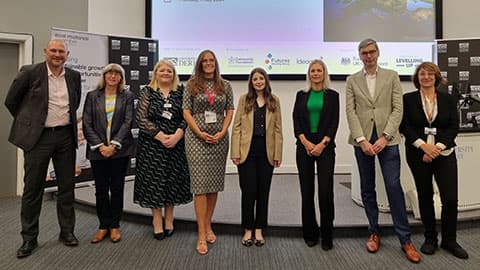 Speakers from the 2024 East Midlands CSR Summit stood in a row.