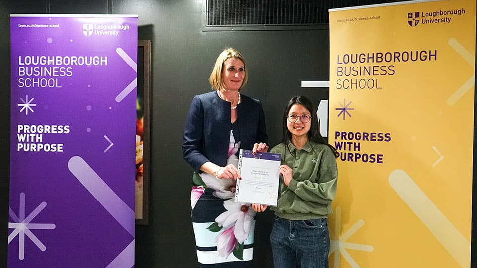 Nicole Tse with their award certificate from Jan Godsell.