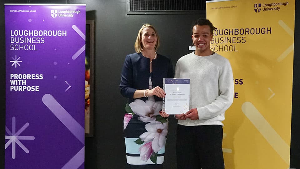 Daniel Addy with their award certificate from Jan Godsell.