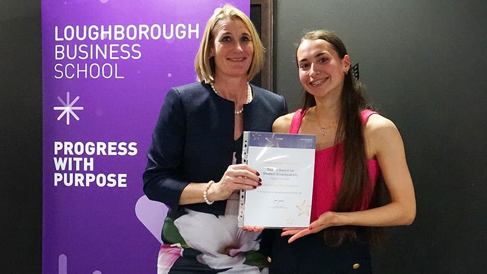 Ekaterina Kondrateva with their award certificate from Jan Godsell.
