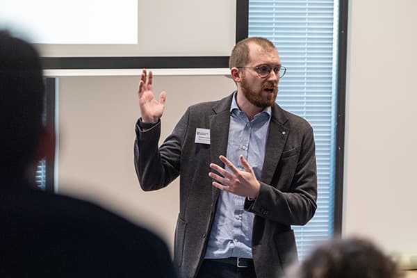 A person delivering a lecture.