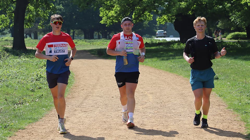 Patrick Welsh, Jack Brown and Nathan Hinckley running together.