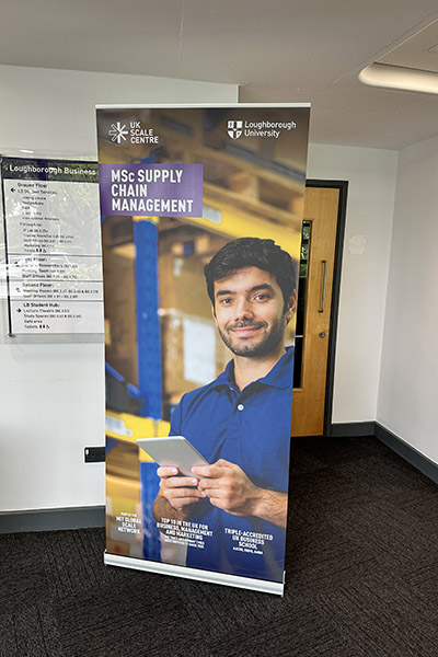 Banner for Loughborough University's MSc Supply Chain Management program, featuring a person with a tablet and university logos.