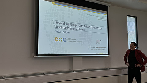 Person presenting a lecture titled 