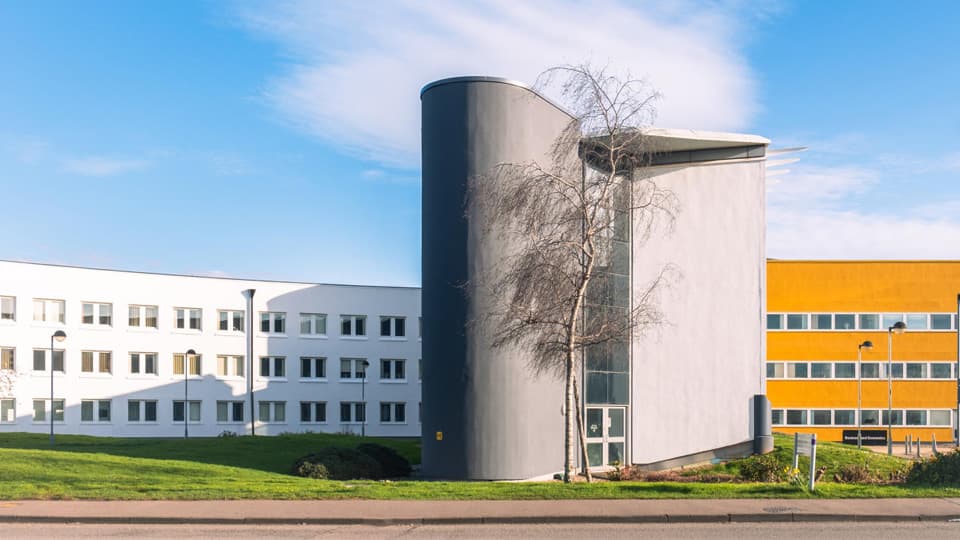 The Loughborough Business School building on a sunny day.