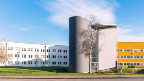 The Loughborough Business School building on a sunny day.