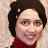 A headshot of Parisa Derakhshan wearing a headscarf