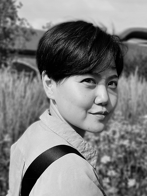 Black and white headshot of Karen Sung